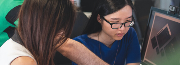 asian-girl-working-monitor